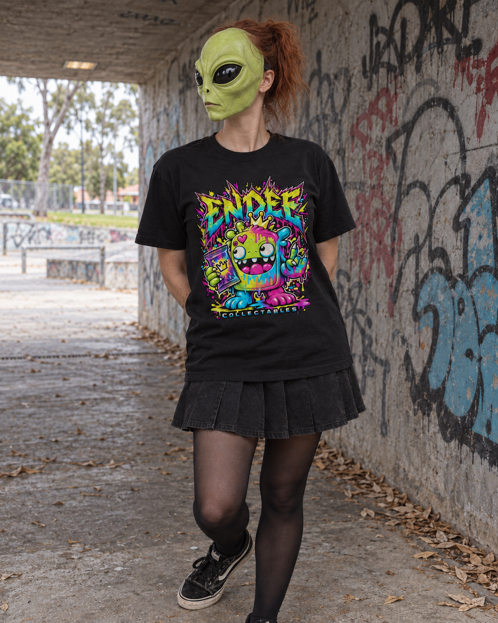 Endee Monster — Graphic Tee in black — varied natural head pose, AI-generated model mockup